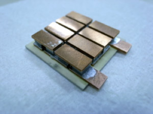 Photo of A prototype of eight-pair thermoelectric power generation module using the new Ba-Ga-Sn-based thermoelectric materials