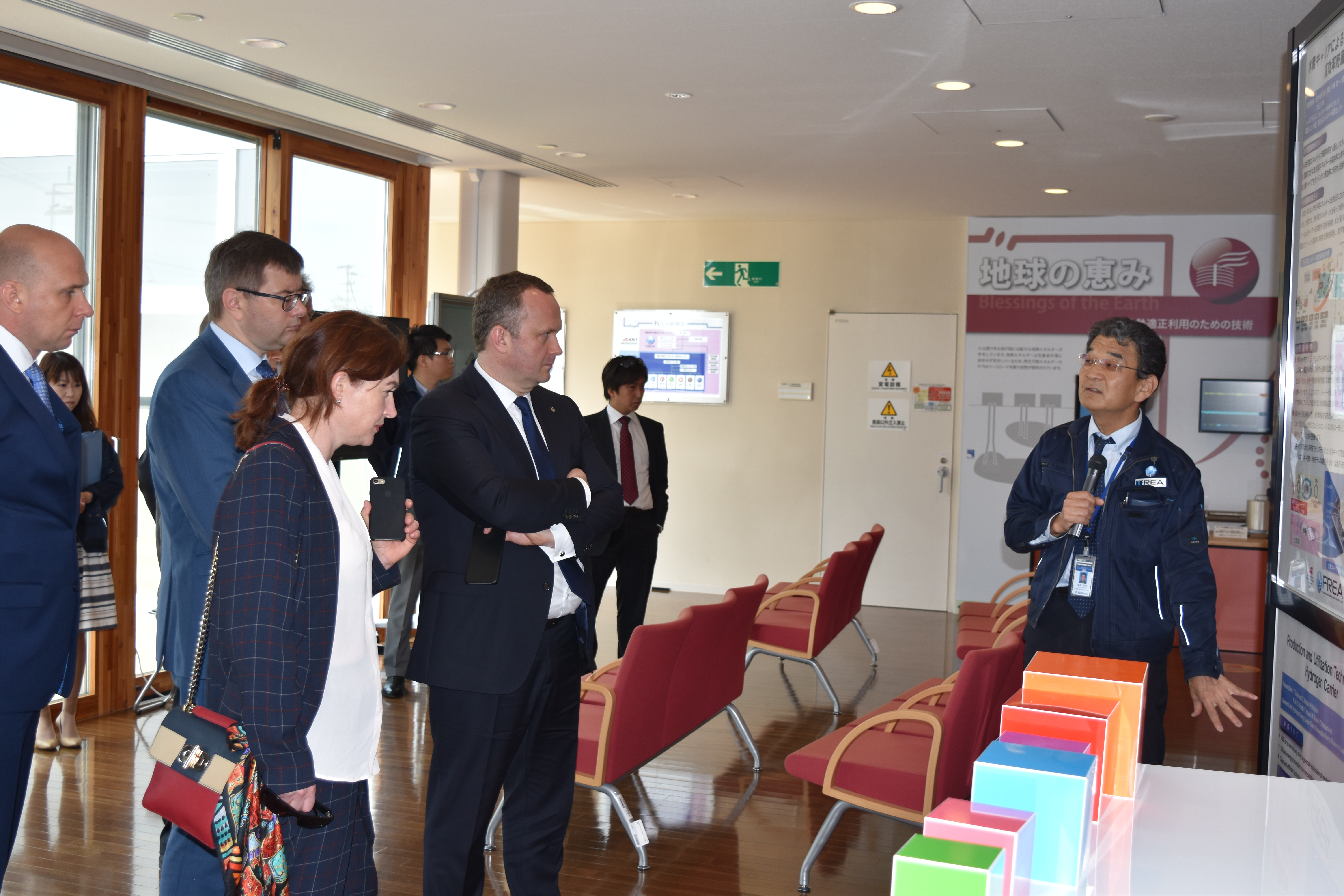 
Mr. Ostap Semerak listening to an explanation of hydrogen energy carrier in the Energy Control Building