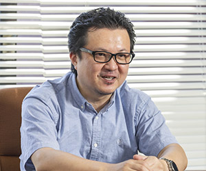 板場 智史主任研究員の写真