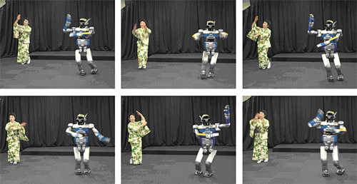 人とロボットの会津磐梯山踊りの写真